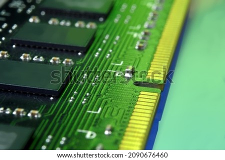 contacts of a microchip of random access memory close-up.