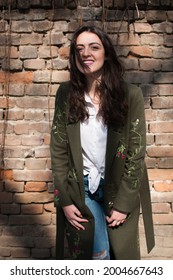 Contagious Smile Of A Young Girl Posing In Downtown Streets.  