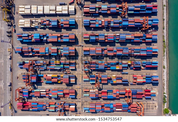 container box storage and the seaport International\
by shipping cargo containers transportation import and export\
business services  the sea flight leam chabang thailand aerial top\
view