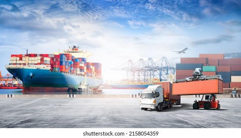 Container cargo freight ship during discharging at industrial port move to container yard by trucks, handlers, cargo plane, copy space, logistic import export background and transport industry concept - Shutterstock ID 2158054359
