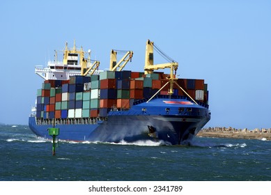 Container cargo ship going into port