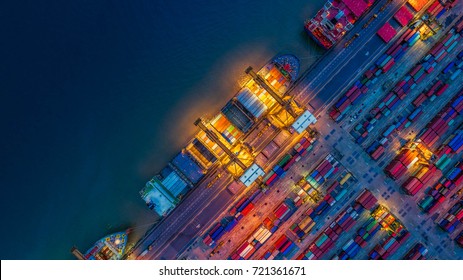 Container Cargo Ship And Cargo Plane With Working Crane Bridge In Shipyard At Sunrise