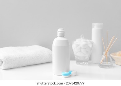 Container With Contact Lenses And Solution In Bathroom