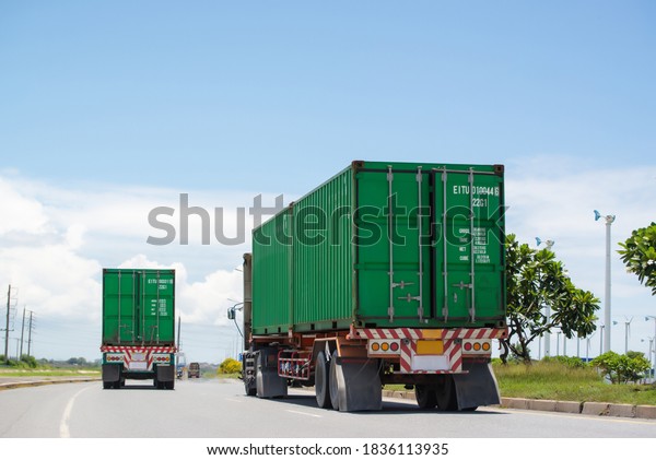 Container\
delivery by truck to gate in to container yard for export, logistic\
import export and transport industry\
background