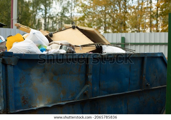 Container with garbage. Waste in the tank.\
Garbage collection in\
Russia.