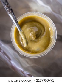 A Container Of Light Coloured Cannabis Hash Rosin