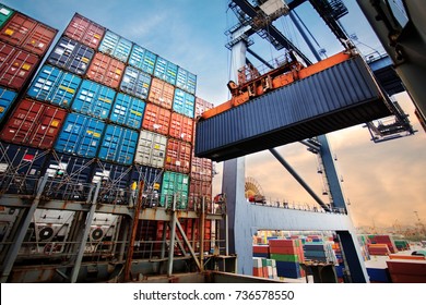 Container loading in a Cargo freight ship with industrial crane. Container ship in import and export business logistic company. Industry and Transportation concept. - Shutterstock ID 736578550