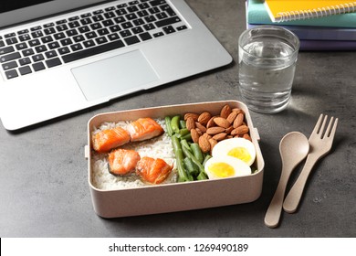 Container With Natural Protein Food On Office Table