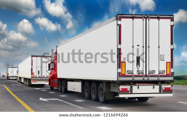 Container on the big\
highway. transport loads. Heavy traffic freight trailers on the\
highway. Cargo\
transportation