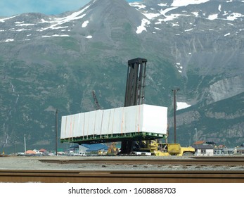 container on lift in Valdez, Alaska, waiting to be loaded on a container Ship.
