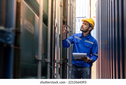 Container operator holding a notepad to do daily inspection while working in container yards.