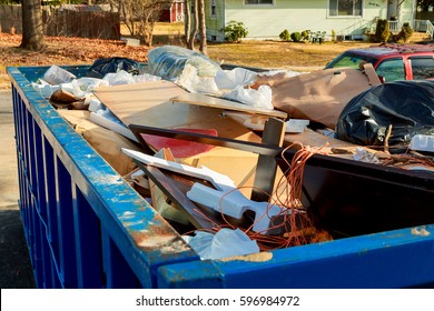 container Over flowing Dumpsters being full with garbage