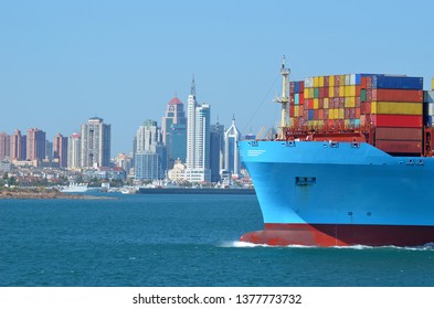 Container Ship Arriving To The Port Of Qingdao In China.