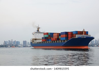 Container Ship Or Cargo Ship. Its Carry All Of Their Load In Truck-size Inter Modal Containers, In A Technique Called Containerization Out Of City. (original File)