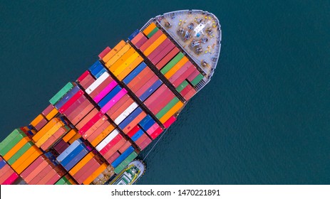 Container ship carrying container aerial view, Business import and export logistic and transportation of international by container ship in the open sea, with copy space. - Shutterstock ID 1470221891