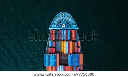 Container ship carrying container for import and export, business logistic and transportation by container cargo ship in open sea, Aerial view container ship vessel.
