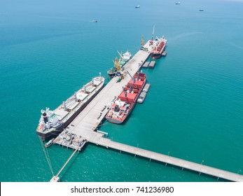 Container Ship Commercial Vessel Alongside In Port For Loading And Discharging Containers Services In Maritime Transports In World Wide Logistics 