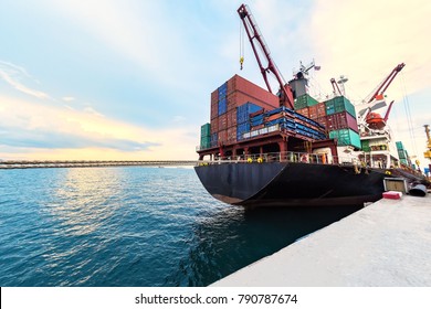 Container Ship Commercial Vessel Alongside In Port For Loading And Discharging Containers Services In Maritime Transports In World Wide Logistics 
