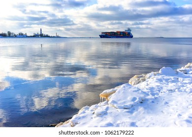 Container Ship Enters The Mouth Of The River