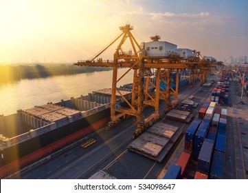 Container ship in export and import business and logistics. Shipping cargo to harbor by crane. Water transport International. Aerial view - Shutterstock ID 534098647
