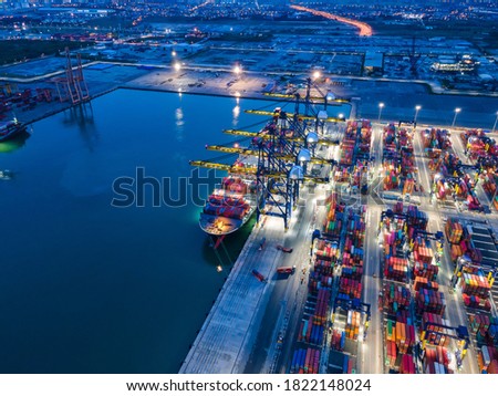 Container , container ship in export and import business and logistics. Shipping cargo to harbor by crane. Water transport International. Aerial view and top view.