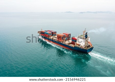 Container ship full speed sailing in sea for transporting cargo logistic import and export goods internationally around the world, including Asia Pacific and Europe, Aerial view photograp from drone 