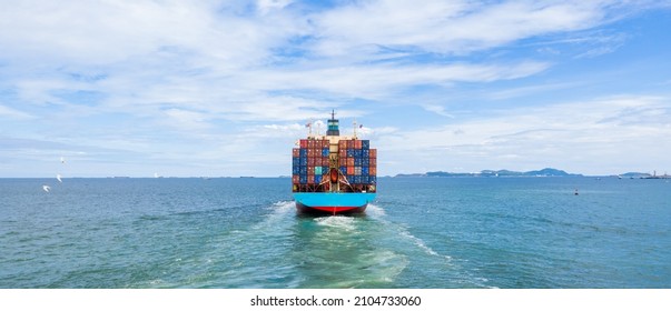 Container ship leaving the industrial seaport, Global business Import export, Company business logistic and transportation international by container cargo freight ship in the open sea.
