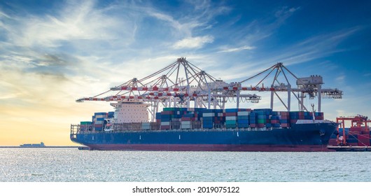 Container ship loading and unloading at commercial dock container terminal, Sea port warehouse and container ship, Crane ship working for containers shipment, Business logistic import export.