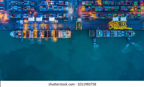 Container ship loading and unloading in deep sea port, Aerial view business commercial trading logistic import and export freight transportation, Container loading cargo freight ship maritime at night - Shutterstock ID 1011983758