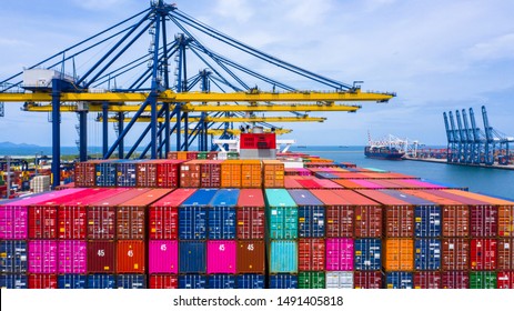 Container ship loading and unloading in sea port, Aerial view of business logistic import and export freight  transportation by container ship in harbor, Container loading Cargo freight ship, Dubai. - Shutterstock ID 1491405818