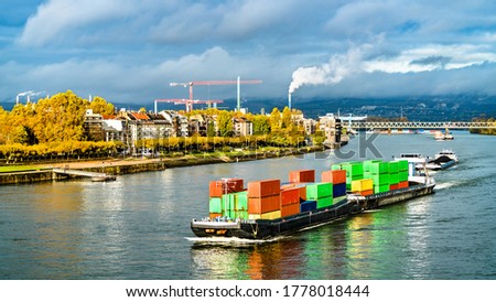 Container ship on the Rhine River in Mainz - Rhineland-Palatinate, Germany