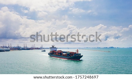 Container ship sailing the ocean, Business cargo logistics service and transportation of International container ship in the ocean freight transportation, Aerial view Container loading cargo freight 
