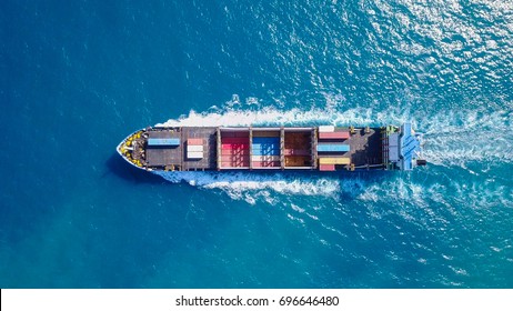 Container Ship At Sea - Top Down Aerial Footage