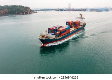 Container Ship Transporting Cargo Logistic Import And Export Goods Internationally Around The World, Including Asia Pacific And Europe, Aerial View Photograp From Drone 