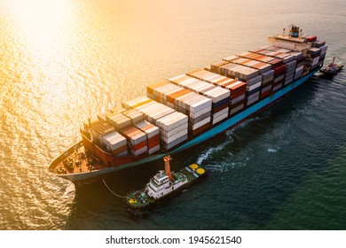 Container Ship Transporting Large Cargo Logistic To Import Export Goods Internationally Around The World, Including Asia Pacific And Europe, By Sea Or Mediterranean Sunlight Rays Aerial View Photograp