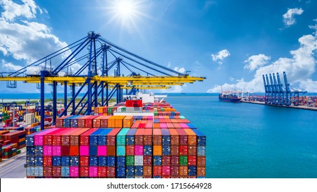 Container ship unloading in deep sea port, Global industry business logistic import export freight shipping transportation oversea worldwide by container ship, Container vessel loading cargo freight.