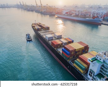 Container Ship Vessel Approaching To The Mail Entrance Of The Port