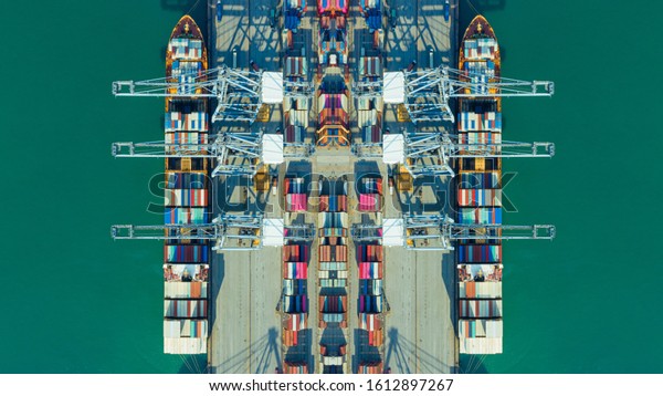 Container ships loading and unloading in Hutchison\
Ports, Business logistic import-export transport international and\
transportation of containers in port, Shipping container buildings,\
Aerial view