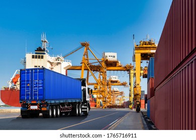 Container truck with crane bridge in shipyard in daylight for Import an export. logistic and transportation concept - Shutterstock ID 1765716911