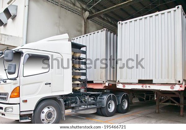 Container truck at warehouse\
building