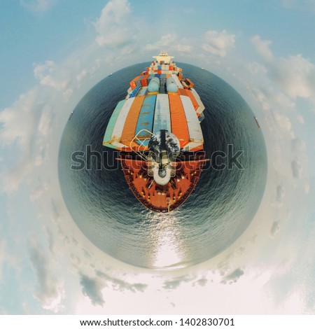 Container vessel in the ocean tiny planet
