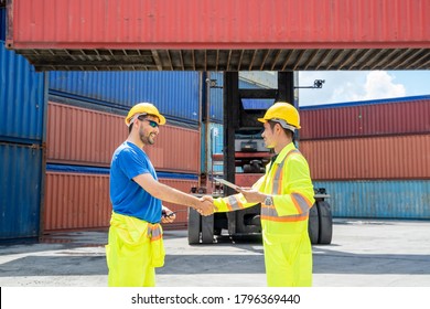 Container worker working together at cargo freight logistic warehouse for import export,Teamwork concept.
