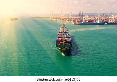 container,container ship in import export and business logistic,By crane ,Trade Port , Shipping,cargo to harbor, Aerial view,Water transport,International,Shell Marine,transportation,logistic,top view - Shutterstock ID 566113438