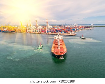 container,container ship in import export and business logistic,By crane,Trade Port , Shipping,cargo to harbor.Aerial view,Water transport,International,Shell Marine,transportation,logistic,trade,port - Shutterstock ID 710238289