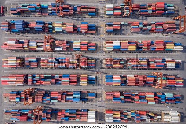 containers to be loaded on to the\
ship for transportation by the sea asia pacific aerial top\
view
