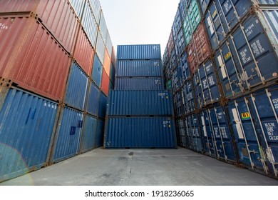 Containers box from Cargo at harbor.Foreman control Industrial Container Cargo freight ship at industry.Transportation and logistic concept.