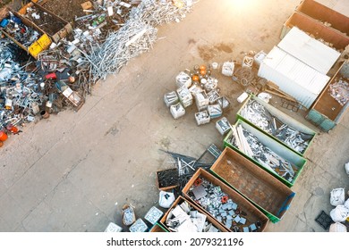 Containers from a height with different types of metal, Sorting for remelting metal products - Powered by Shutterstock