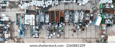 Containers from a height with different types of metal, Sorting for remelting metal products