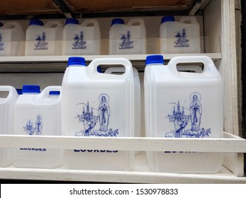 Containers of holy water sold at the town of Lourdes in Southwest France. The town is a major Catholic pilgrimage site where millions arrive annually to drink, wash and be healed by local spring water
