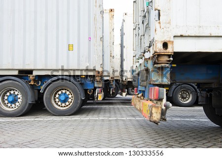 Containers on trailers parked